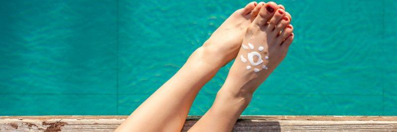 feet over the pool with sunscreen