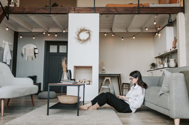 woman on computer in house