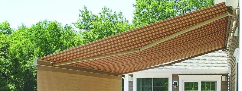 striped red awning above pool