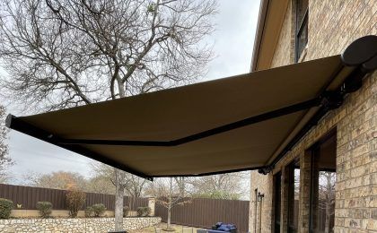 Home with a retractable awning