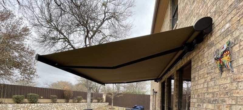Home with a retractable awning