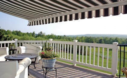 House with a striped deck awning