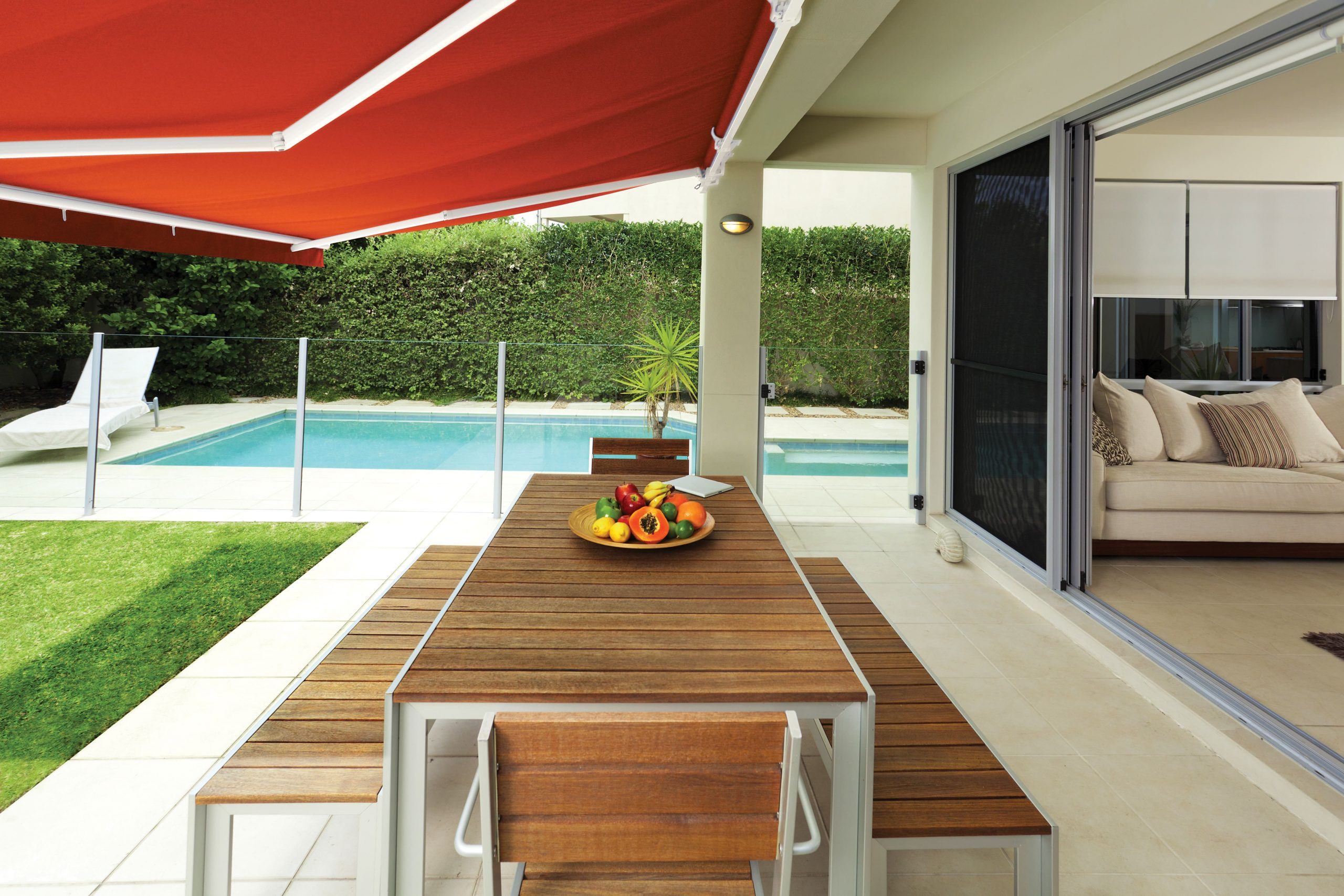 Patio awning by a pool