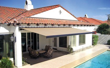 Home with a motorized awning in Texas