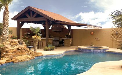 Pool cabana with a patio awning in Texas