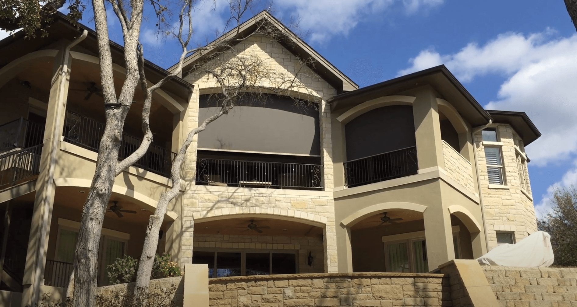 Home with patio screens on their porch area