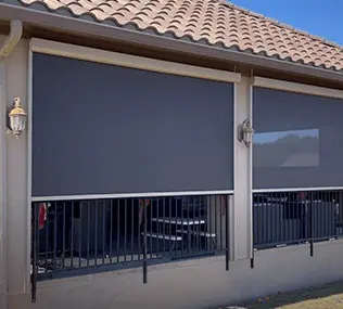 Home with patio screens on the back porch in Texas