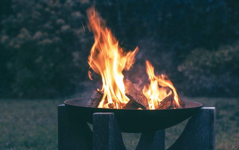A firepit with a fire in it