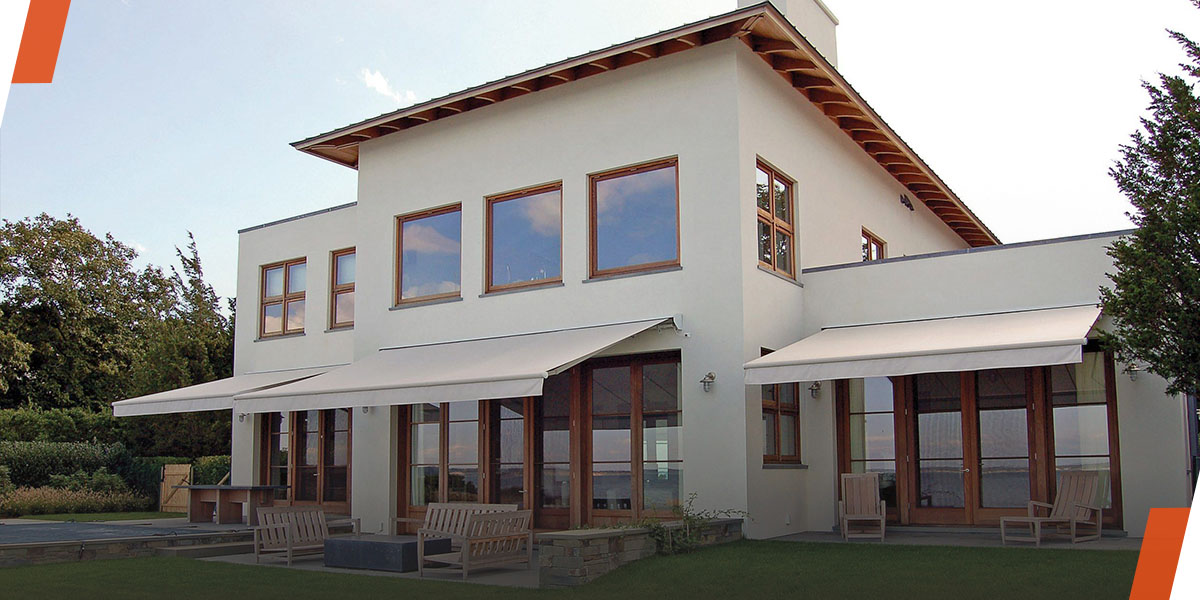 Outdoor space with retractable awnings